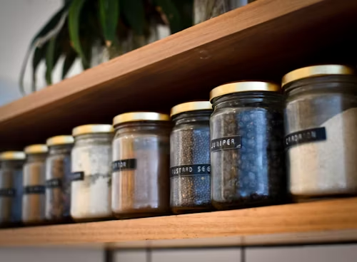 Kitchen condiment shelf