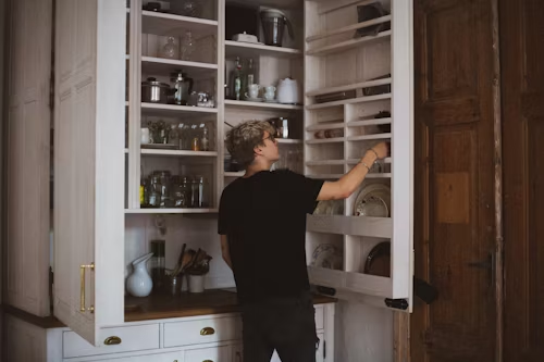 Man checking the shelf